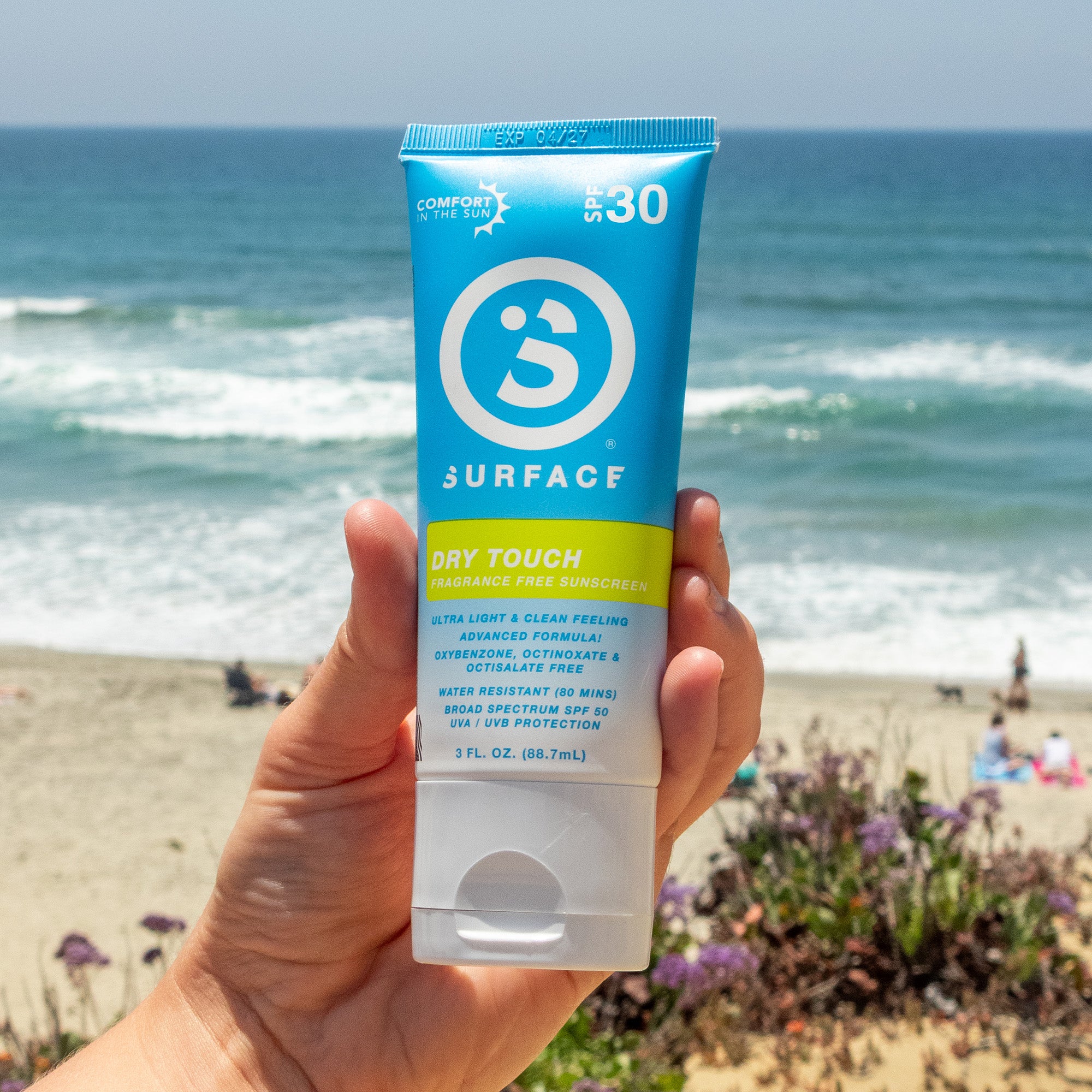 SPF30 Dry Touch Sunscreen Lotion 3oz. at the beach on a very sunny day